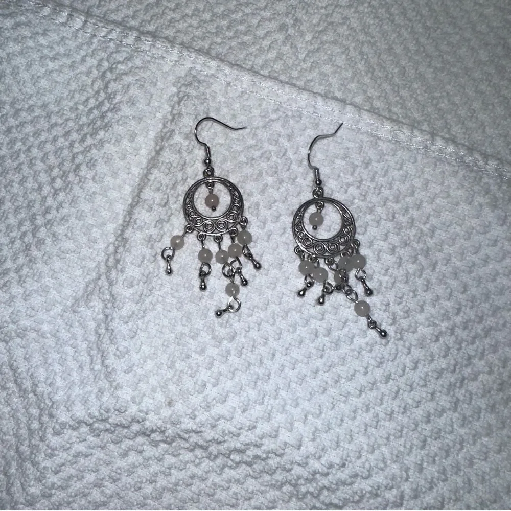 Fashion filigree with white pearl like beads
